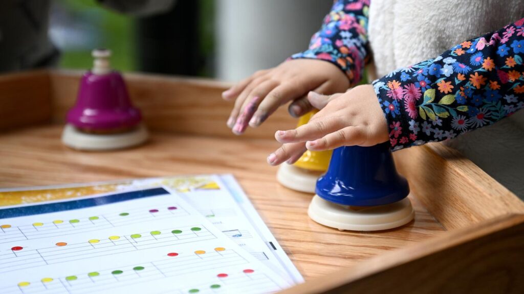 An after-school-hours care worker facing child abuse charges worked at nearly 60 centres.
