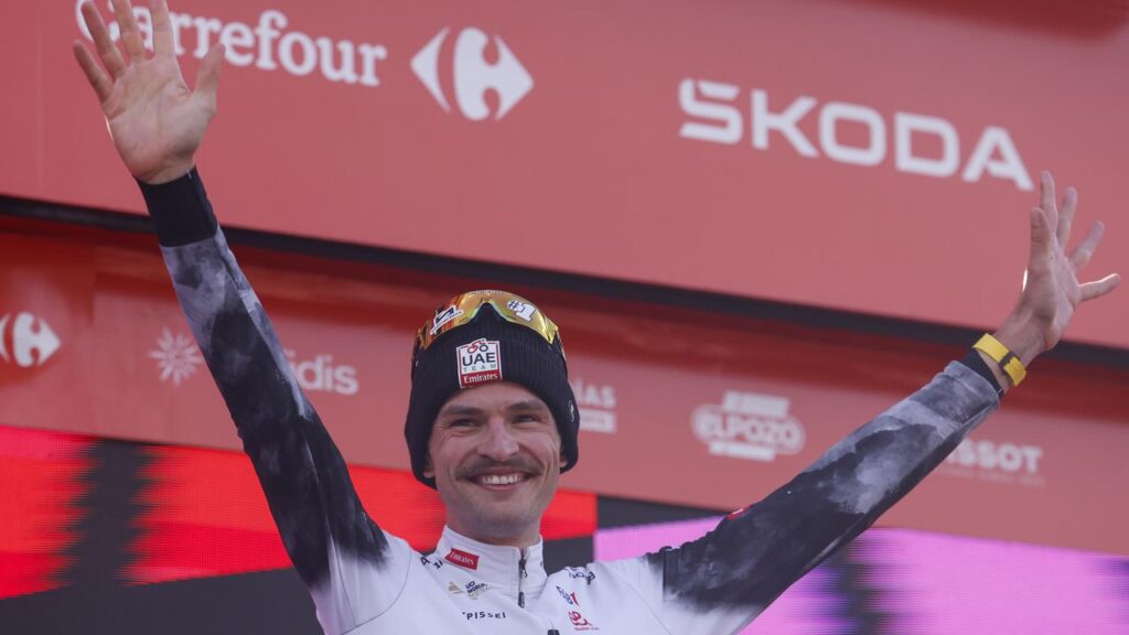 Australian rider Jay Vine celebrates his third Vuelta a Espana triumph in Andorra.