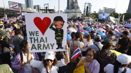 Protesters rally at Victory Monument