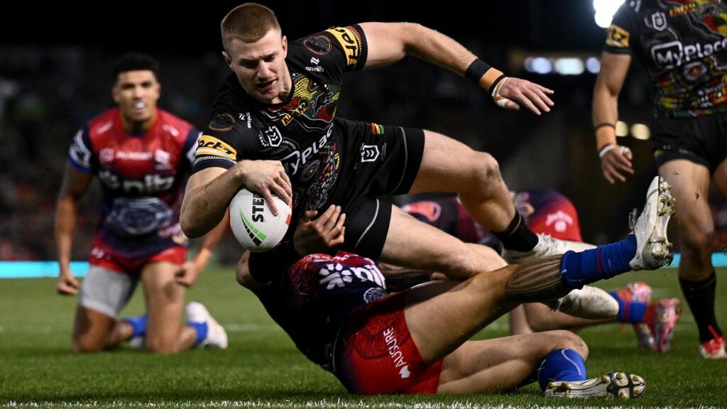 Luke Garner crashes in for his early try, opening the floodgates as Penrith beat Newcastle 48-12.  
