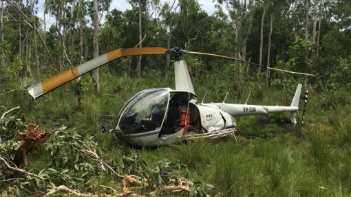 HELICOPTER CRASH VICTIM HANGING FROM CABLE
