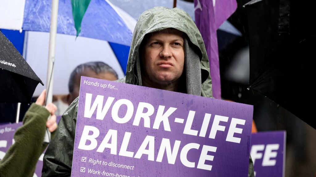 Dozens of people have demonstrated at an education summit over fears for 1500 university jobs.
