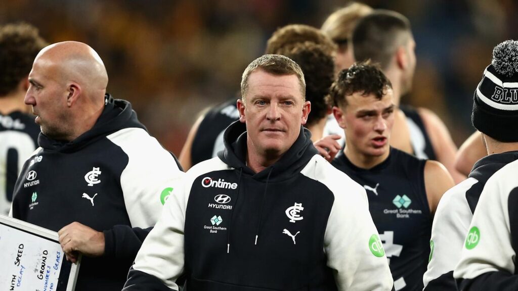 Under-pressure coach Michael Voss has been entrusted with leading Carlton into next season.