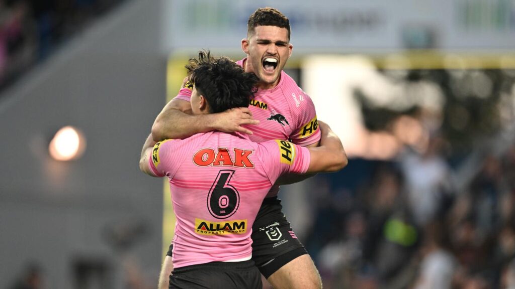 Penrith have roared early but needed extra time to fend off a gallant Titans side on the Gold Coast.
