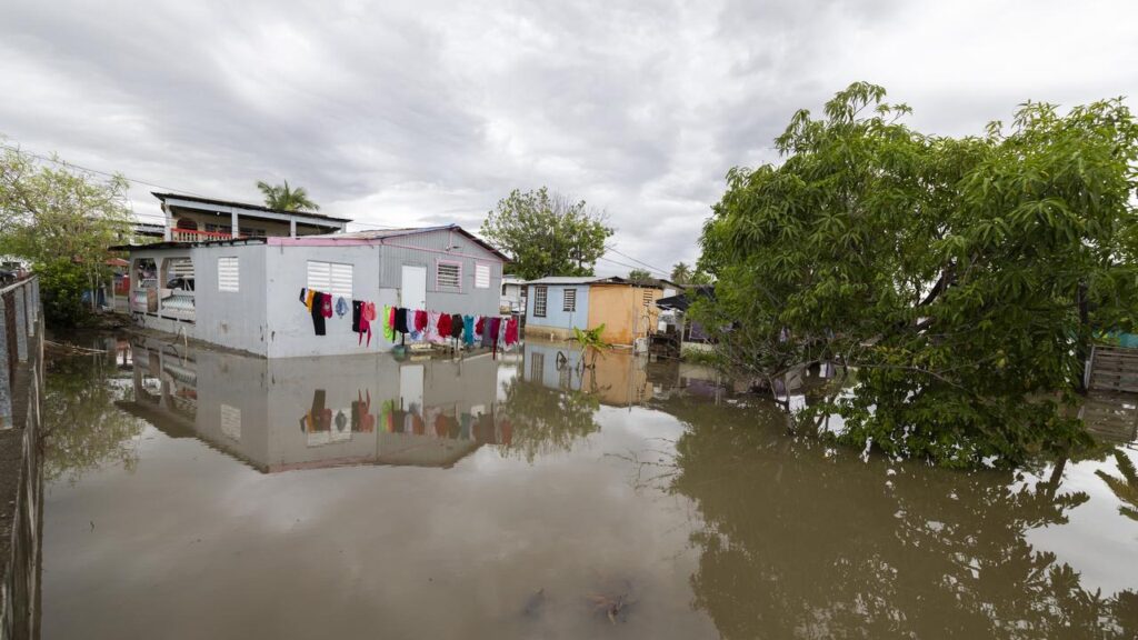 At least two people have died as rains from Hurricane Erin continue.
