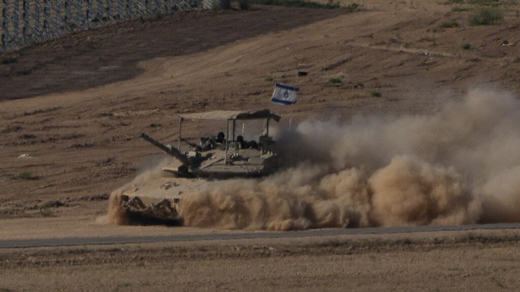 Israeli tanks have advanced on a neighbourhood on Gaza City’s outskirts amid truce hopes.
