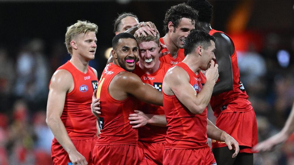 The Gold Coast Suns thrashed hapless Essendon by 95 points to make the finals for the first time.