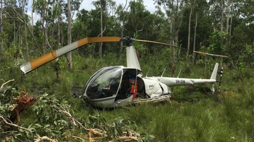 HELICOPTER CRASH VICTIM HANGING FROM CABLE