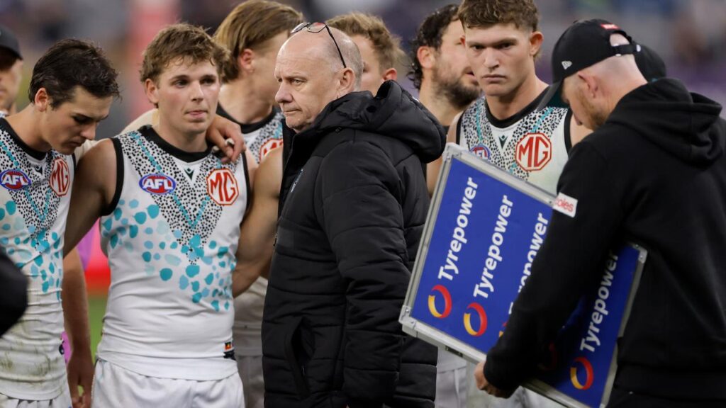 Ken Hinkley is retiring after a 13-year stint as Port Adelaide coach.

