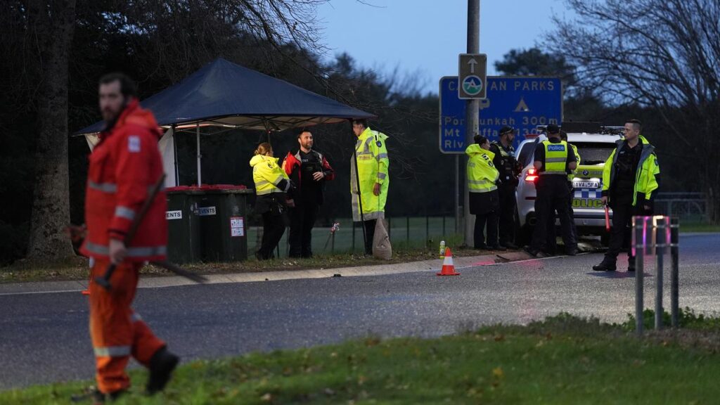 The manhunt for an armed man who killed two police officers has continued into the night.