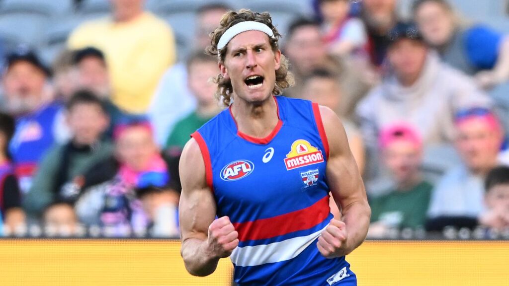 Aaron Naughton’s five goals have helped the Bulldogs to a vital six-point win over Melbourne.