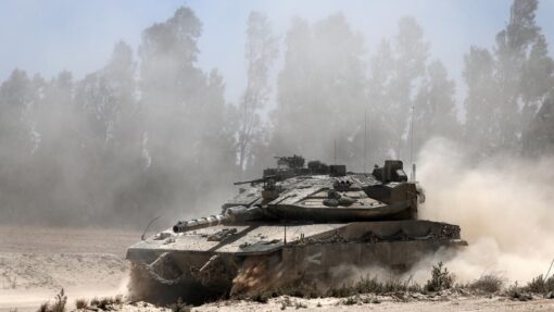 Israeli troops gather at Gaza border