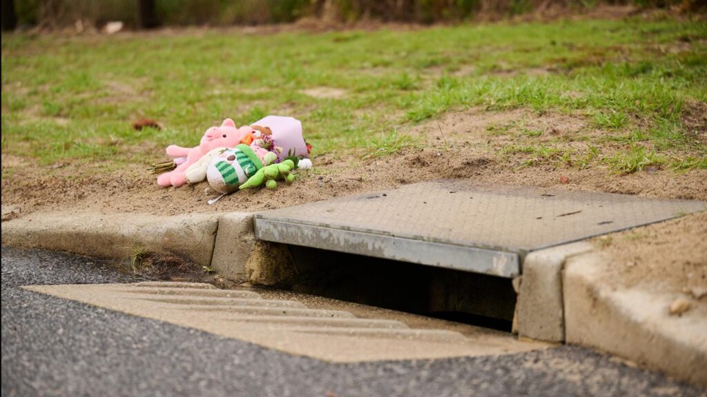 The infant’s body was found in a stormwater drain by two workers carrying out routine maintenance.
