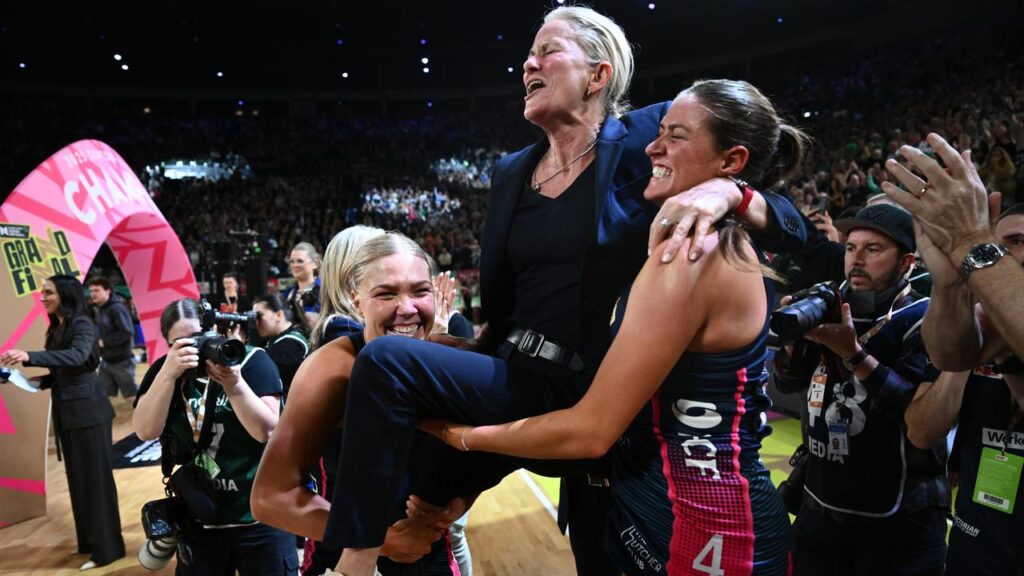 Vixens head coach Simone McKinnis (centre) celebrates at Rod Laver Arena.