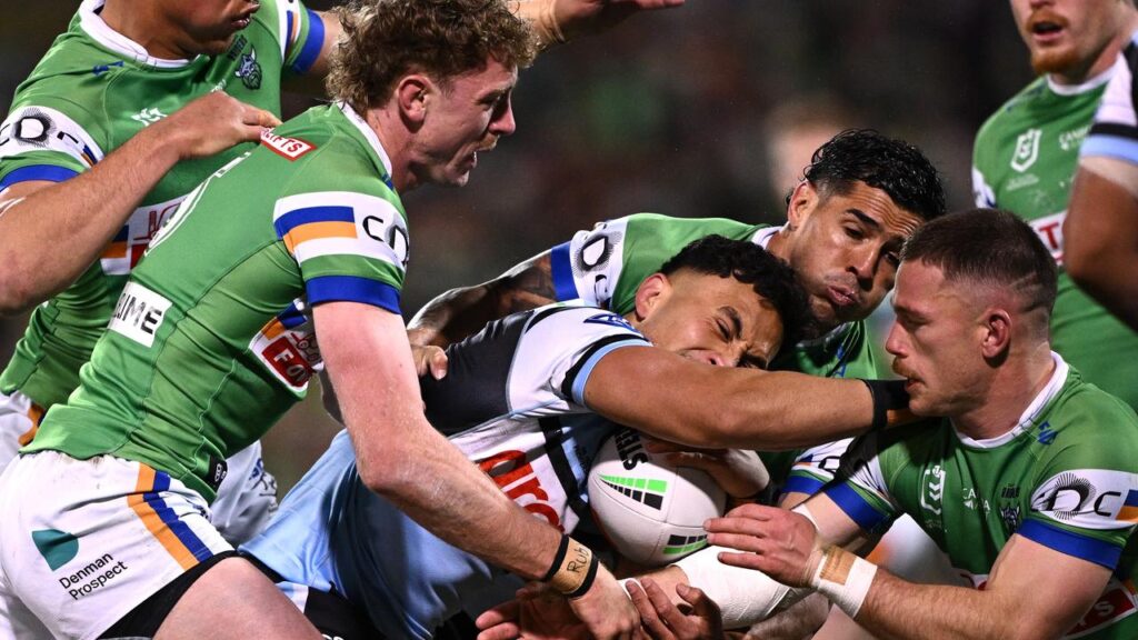 Cronulla’s Iro loves a challenge as evidenced by taking on an army of Raiders here.
