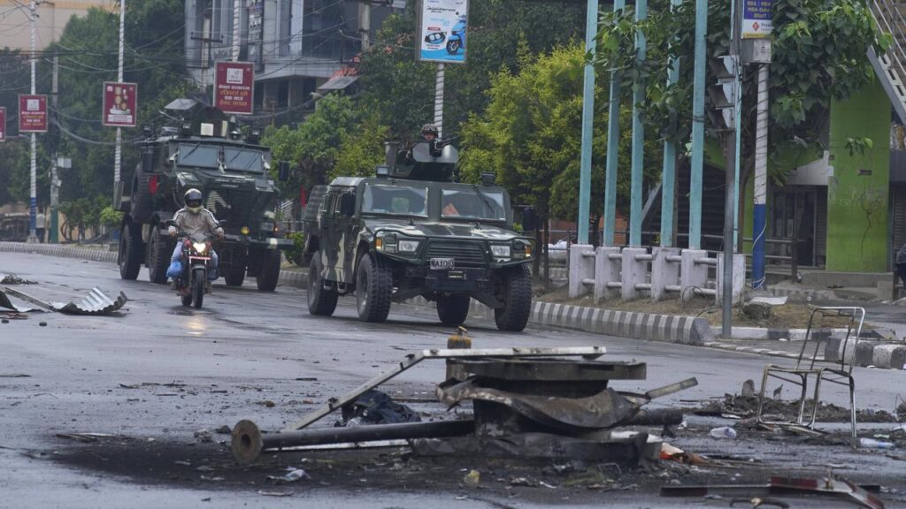 Nepalese army personnel are patrolling the streets in Kathmandu following two days of unrest.
