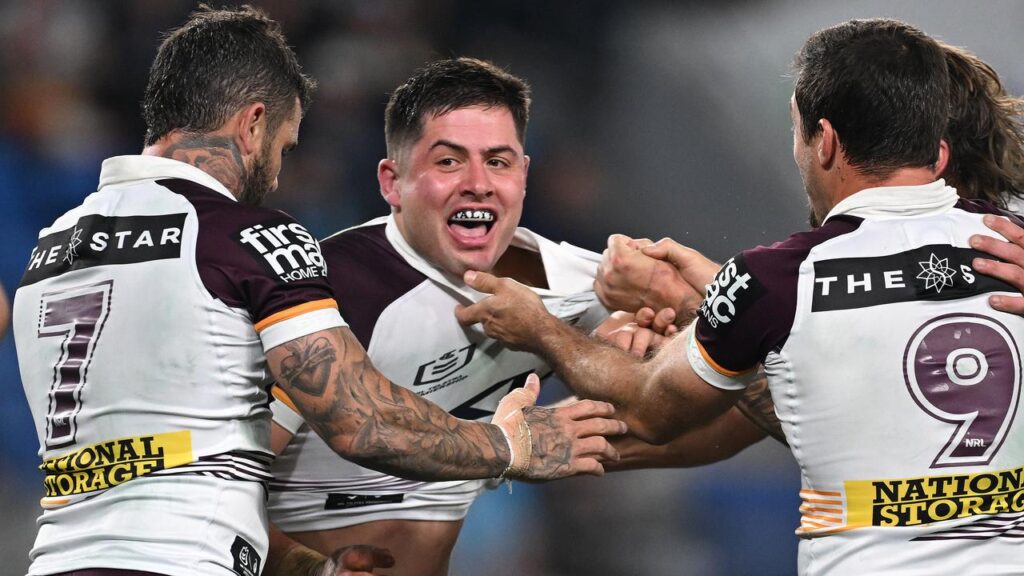 Brisbane prop Ben Talty (centre) had more reasons to smile after signing a two-year extension.
