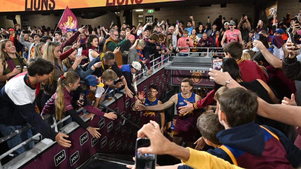 A season-record Gabba crowd attended the AFL semi-final between Brisbane and the Gold Coast.
