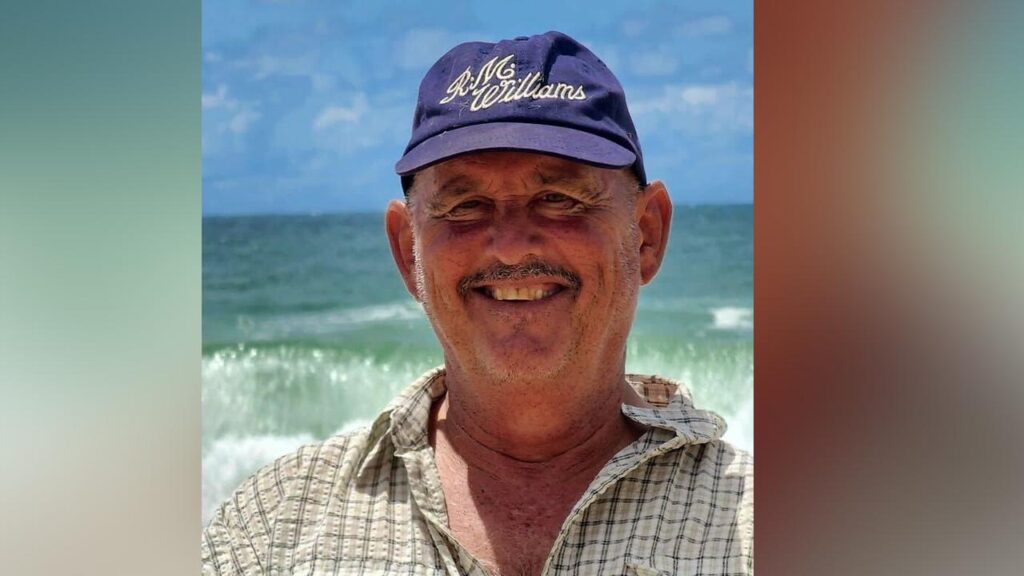Martin Lloyd has received a bravery decoration for saving a woman from floodwaters in Queensland.