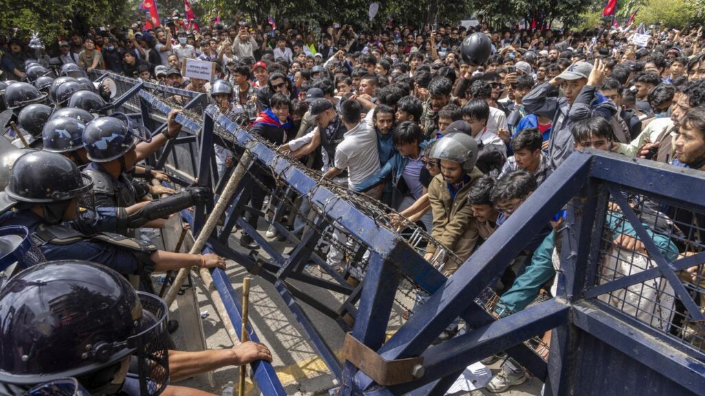 Protesters clashed with police in front of the parliament building in Kathmandu, Nepal.
