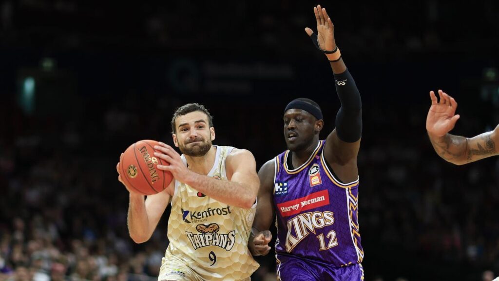 Jack McVeigh, under pressure from Kouat Noi, was key to the Taipans’ win over the Kings in Sydney.

