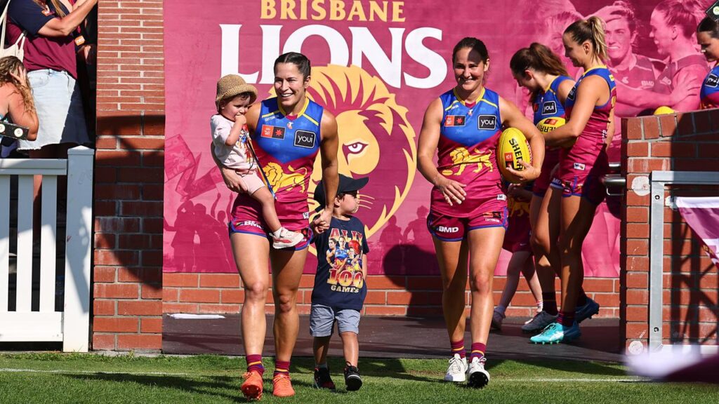 Brisbane star Ally Anderson led the Lions on to the field ahead of her 100th AFLW match. 
