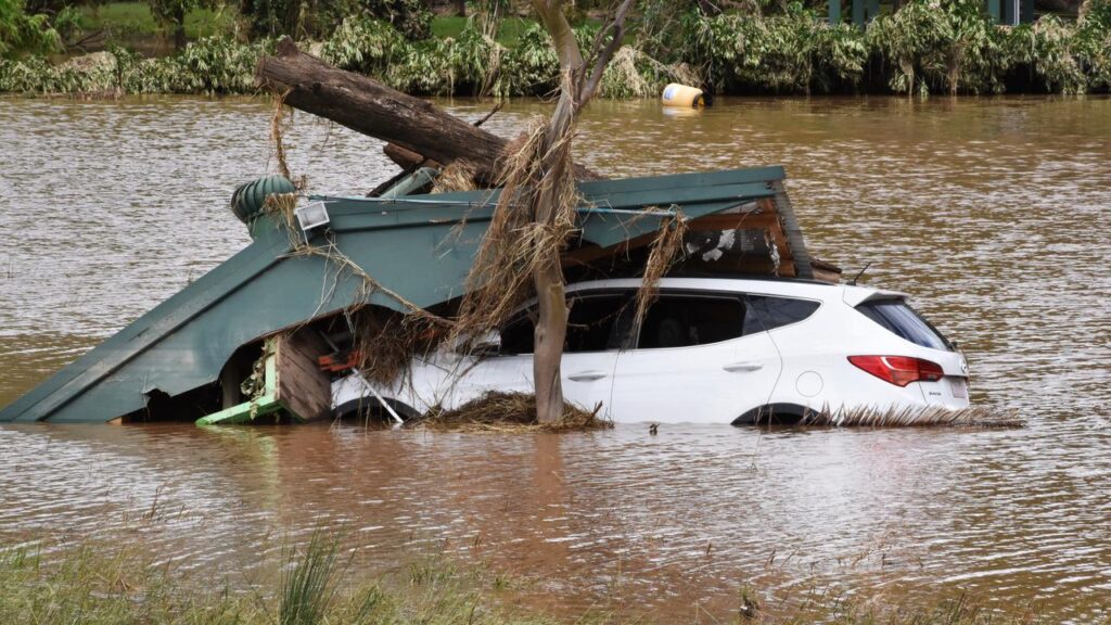 A senior meteorologist has defended a weather bureau warning minutes before a deadly flash flood.