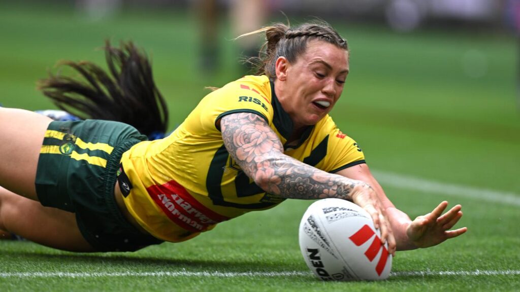 Julia Robinson broke Australia’s try-scoring record in a 60-0 thumping of Samoa.
