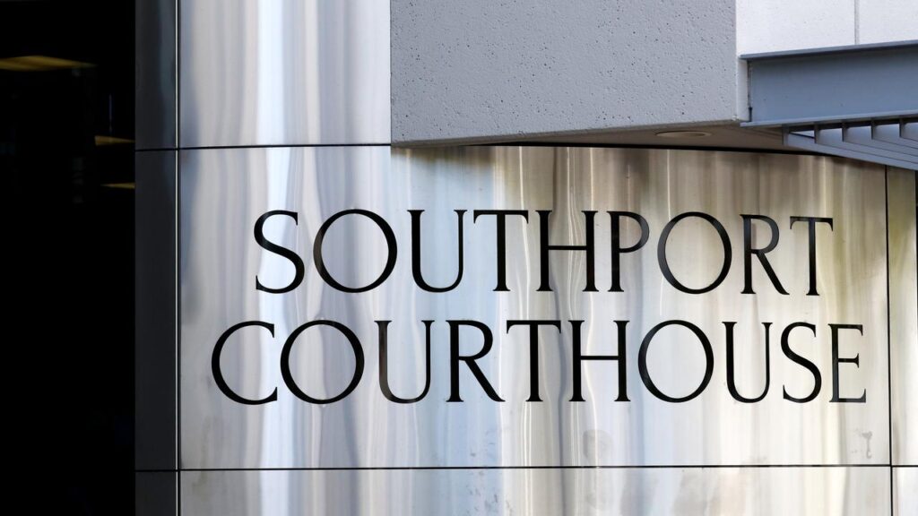 A man who was allegedly driving when his young son was fatally injured in a crash has wept in court.