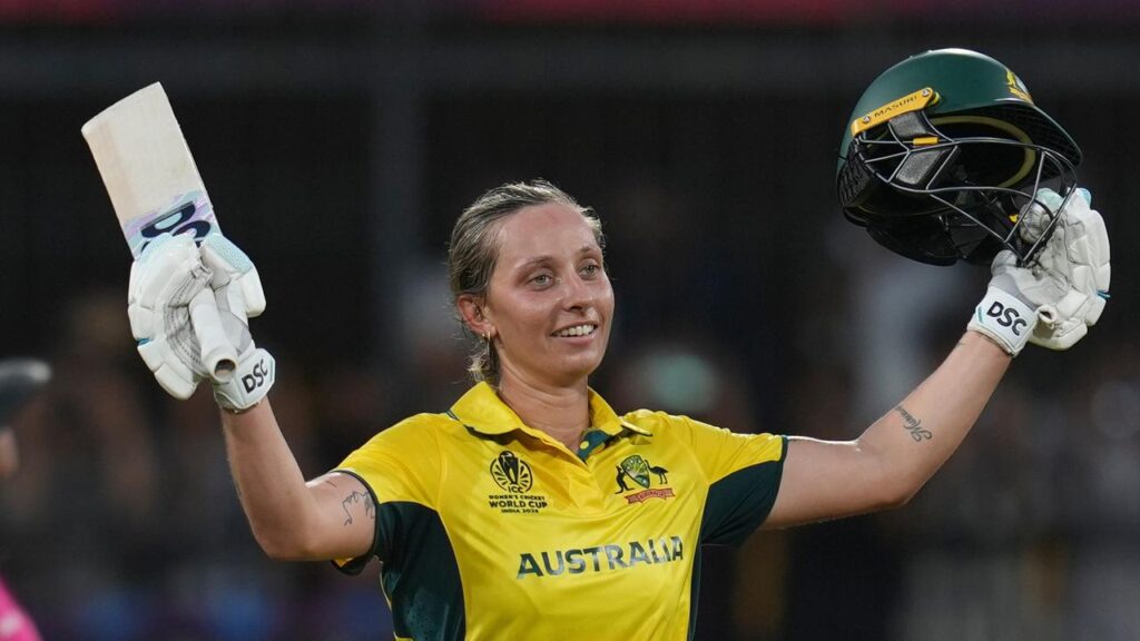 Ash Gardner celebrates her ton in Australia’s World Cup opener with NZ at Holkar Stadium, Indore.
