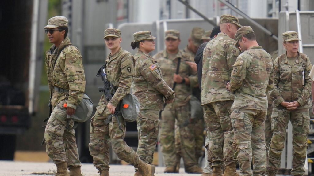 Texas National Guard troops assembled at an army reserve facility southwest of Chicago.
