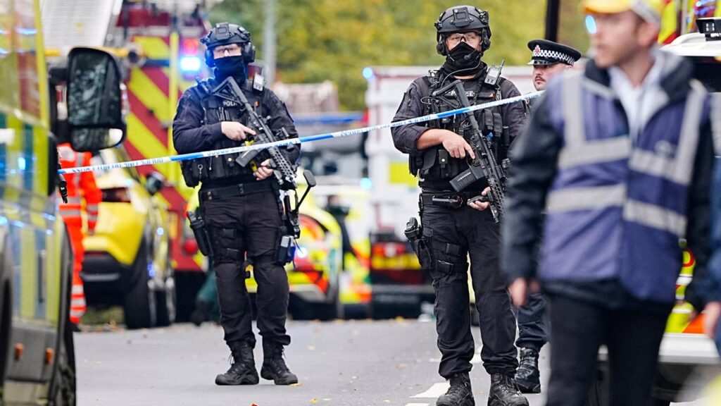 Armed police officers were called to the stabbing in Crumpsall in northern Manchester.
