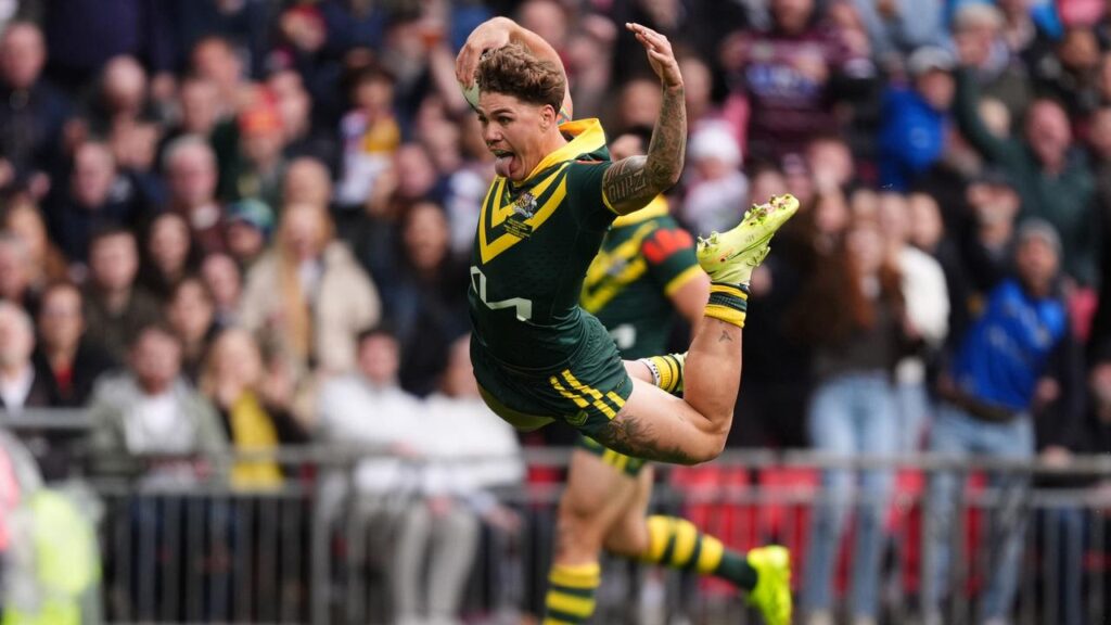 Tongue out, diving theatrically, Reece Walsh scored a try in the Ashes Test in inimitable fashion.