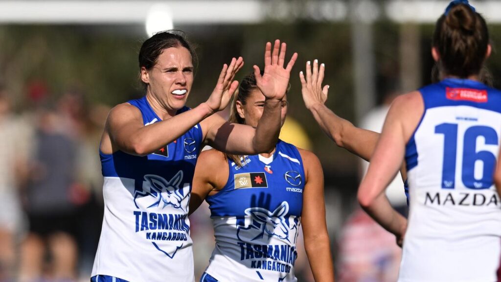 Jasmine Garner (l) went top of the AFLW season goal-kicking list as North Melbourne beat Richmond.
