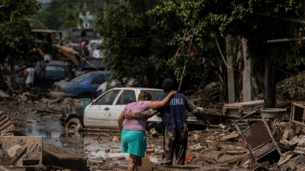 The intense rain has destroyed infrastructure such as bridges and left streets filled with mud.