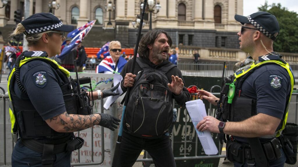 An anti-immigration rally and counter-protest turned violent as police tried to separate the groups