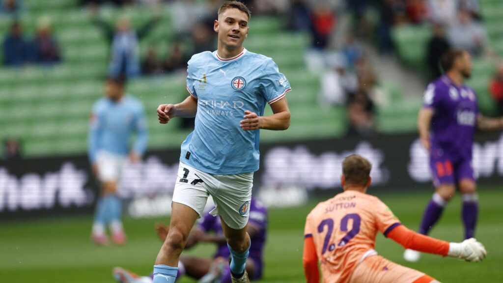 Max Caputo celebrates one of his two goals as Melbourne City thumped Perth Glory 4-0.