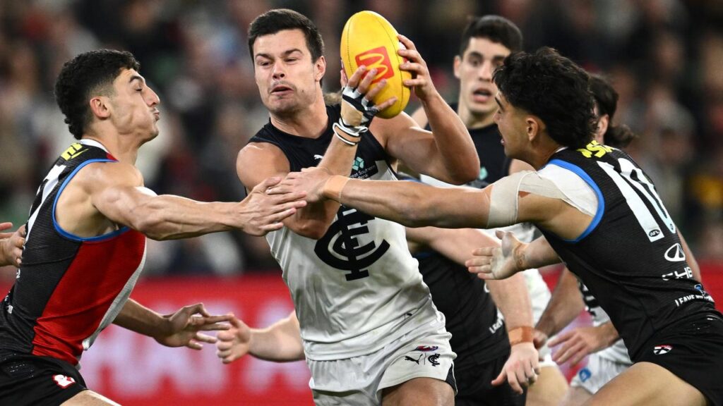 Jack Silvagni (centre) will be in St Kilda colours next season.
