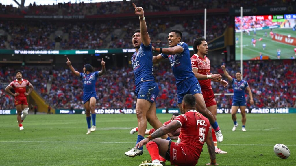 Samoa star Jeremiah Nanai celebrates one of his two brilliant tries against Tonga.
