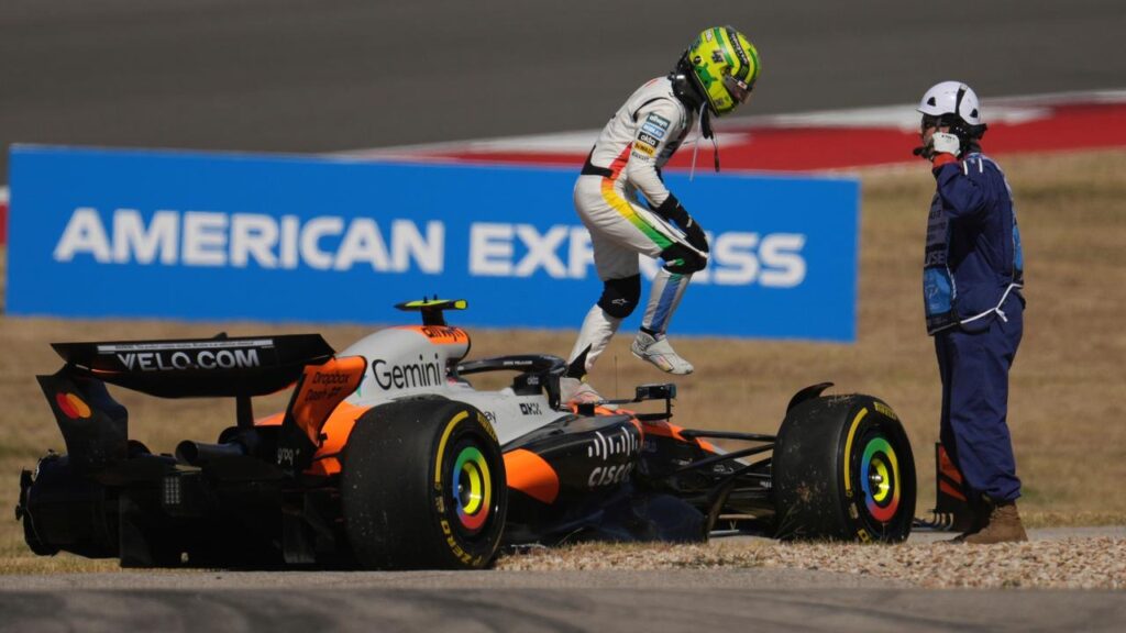 McLaren’s Lando Norris leaves his damaged car during the sprint race in Austin, Texas.