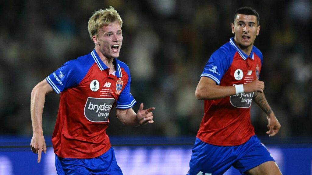 Oscar Fryer (L) has scored a belter in extra time to help Newcastle win the Australia Cup.

