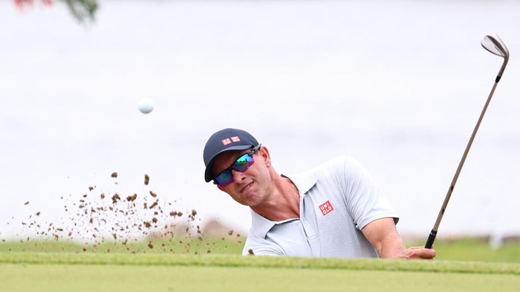 ON THE CHARGE: Adam Scott was four under through nine holes before the storm arrived.
