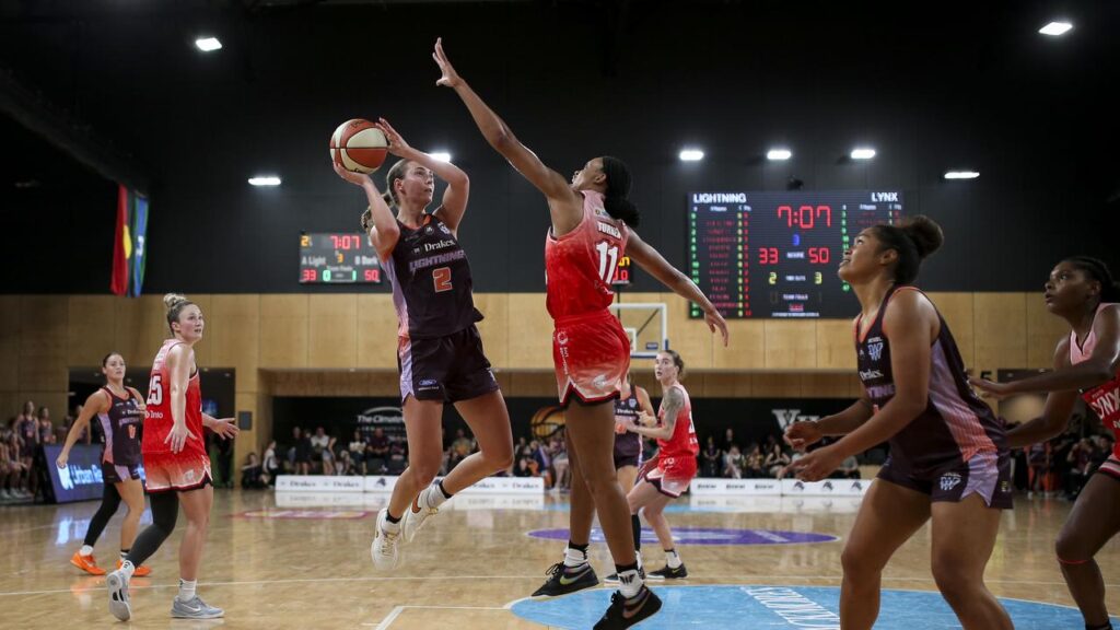 Adelaide Lightning star Serena Sundell (with ball) has suffered a season-ending ACL injury.
