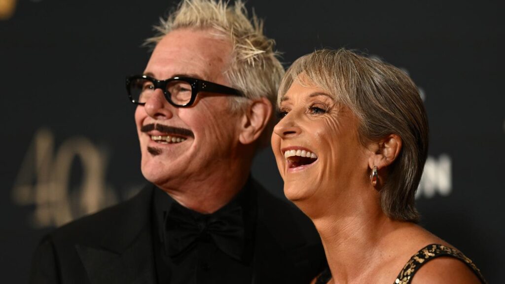 Layne Beachley, seen with husband Kirk Pengilly, has won Sport Australia Hall Of Fame’s Dawn award.
