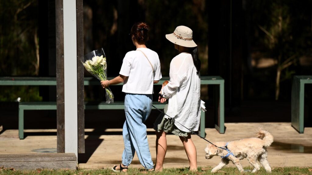 People pay condolences to a teen’s family and friends after the 17-year-old was fatally stabbed.
