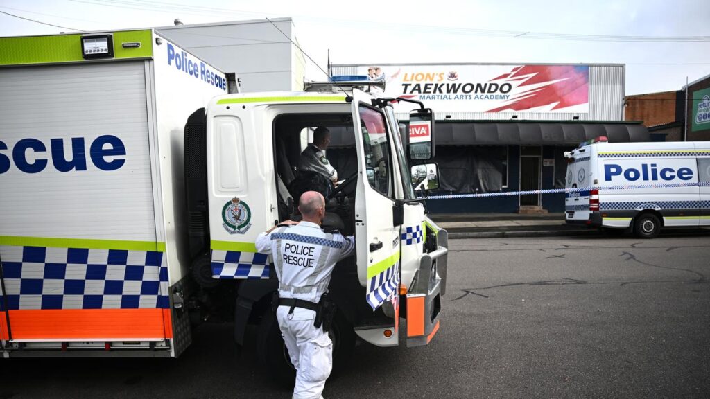 A taekwondo teacher who killed a young student and his parents has faced their relatives in court.
