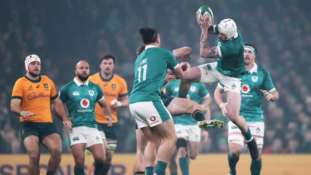 Mack Hansen (R) ran in three ties as Ireland overwhelmed the Wallabies in Dublin.

