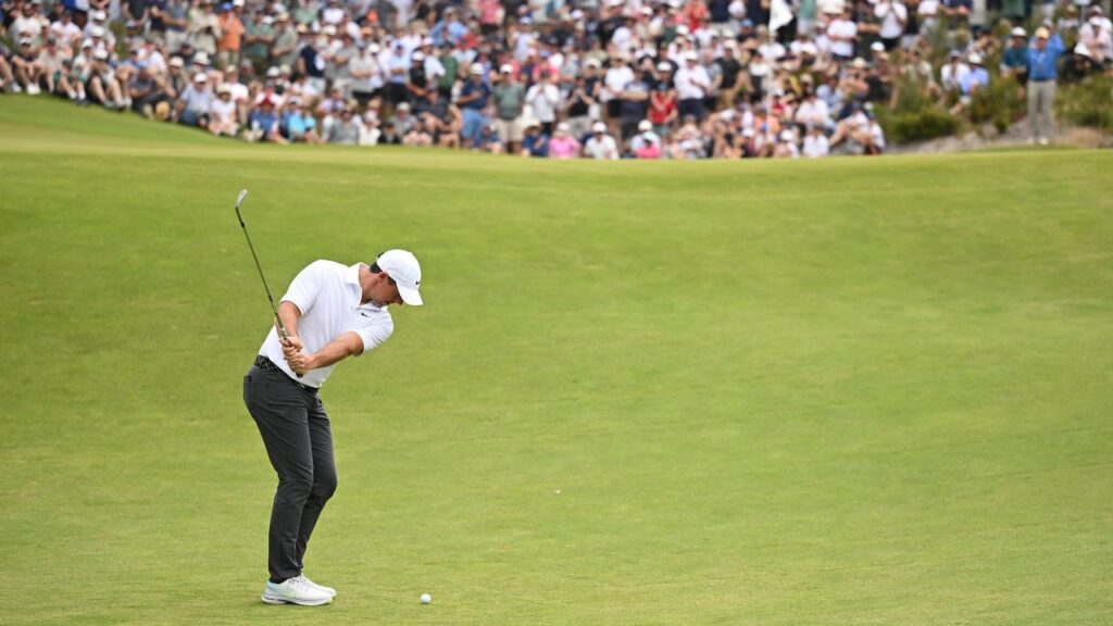 A huge crowd watched on as Rory McIlroy went to work at Royal Melbourne.
