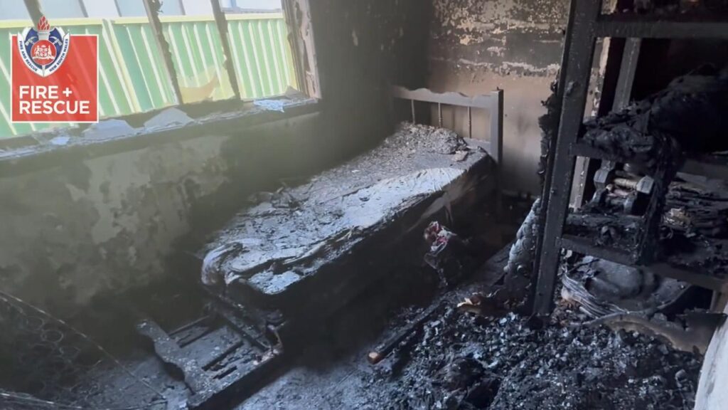 A food-delivery driver died when a battery charging beside his bed exploded and started a fire.

