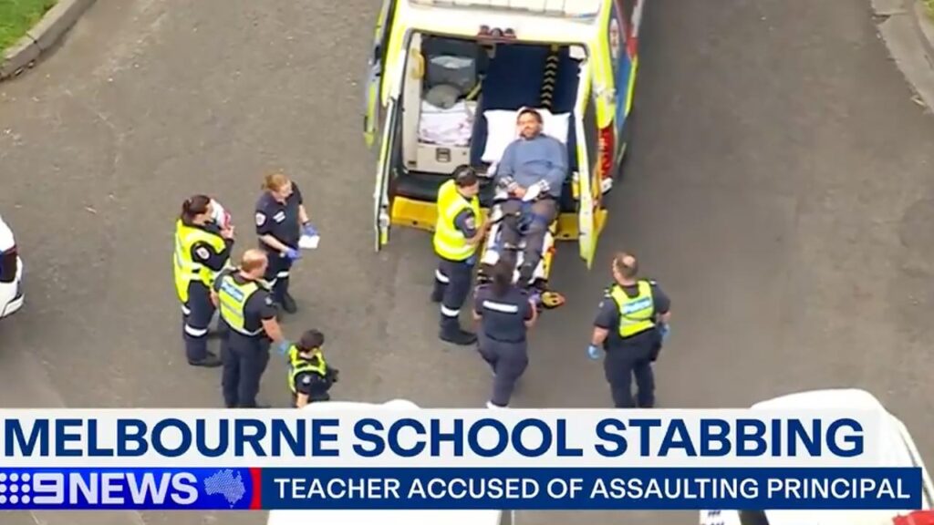 School principal Aaron Sykes suffered a stab wound to his arm and a cut to his lip.
